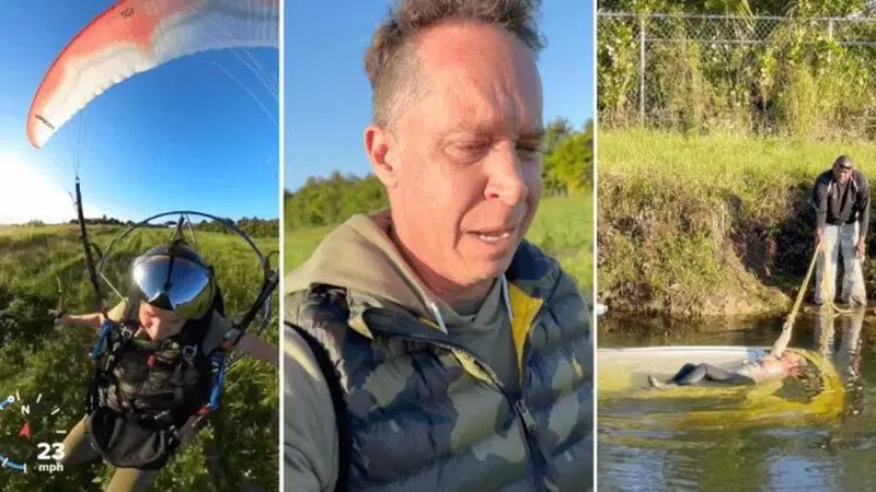 Arriva col parapendio e salva una donna caduta nel fiume con l'auto [VIDEO]