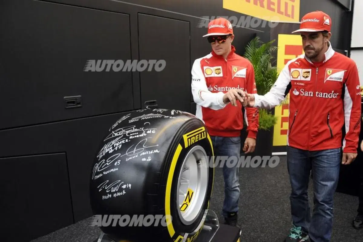 F1 2014: uno pneumatico Pirelli firmato dai piloti per la partita per la pace (2)